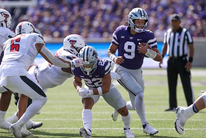 Oct 1, 2022; Manhattan, Kansas, USA; Kansas State Wildcats quarterback Adrian Martinez (9) follows the block of running back Deuce Vaughn (22) during the first quarter against the Texas Tech Red Raiders at Bill Snyder Family Football Stadium.